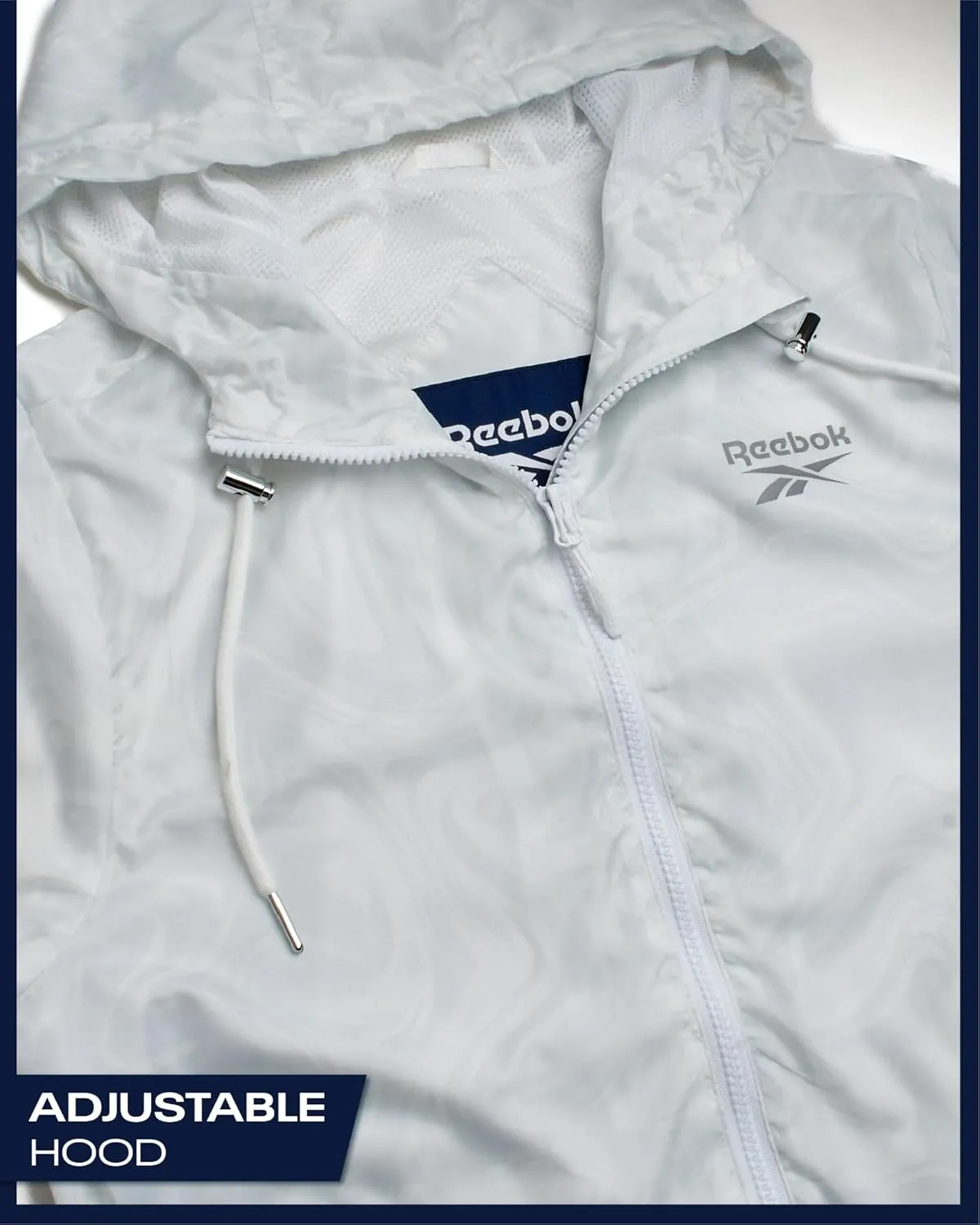 Reebok Womens Windbreaker Jacket - Lightweight Water and Wind Resistant Outdoor Hooded Rain Coat for Running (Sizes: S-XL)