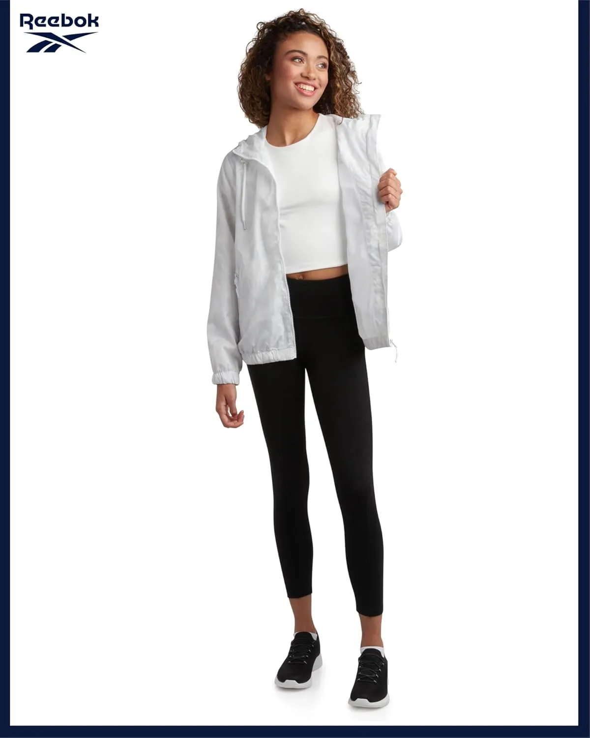 Reebok Womens Windbreaker Jacket - Lightweight Water and Wind Resistant Outdoor Hooded Rain Coat for Running (Sizes: S-XL)